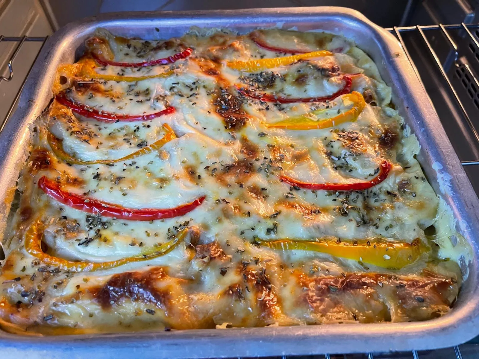 Step 10, photo 2: Bake at 180°C according to the instructions on your lasagna sheets package, or until the t