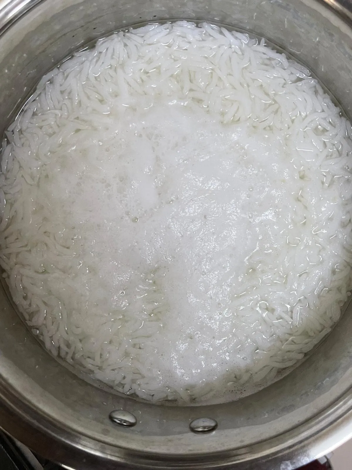 Step 2: Once the grains have swollen, look a little translucent, and are chewable but still firm, 